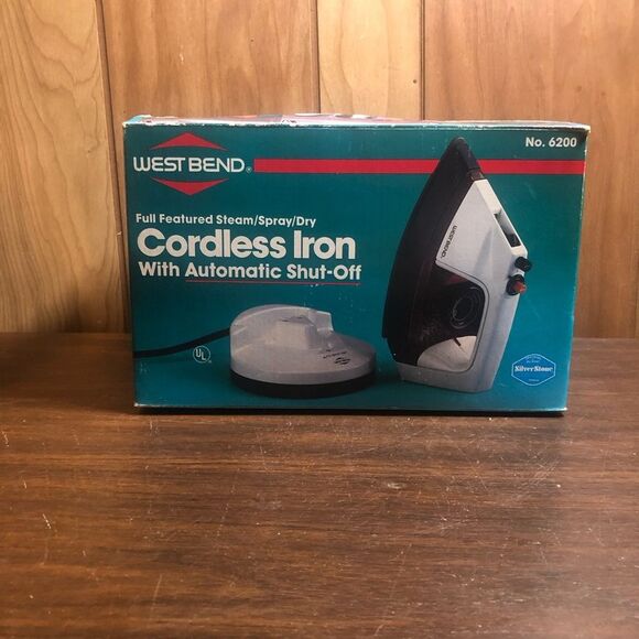 Sleek Black and White Cordless Iron - Picture 1 of 7